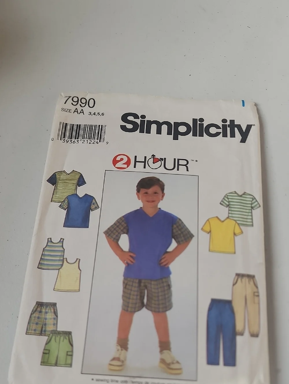 Simplicity Kids' Blue V-Neck Top with Plaid Shorts Pattern Cover Art